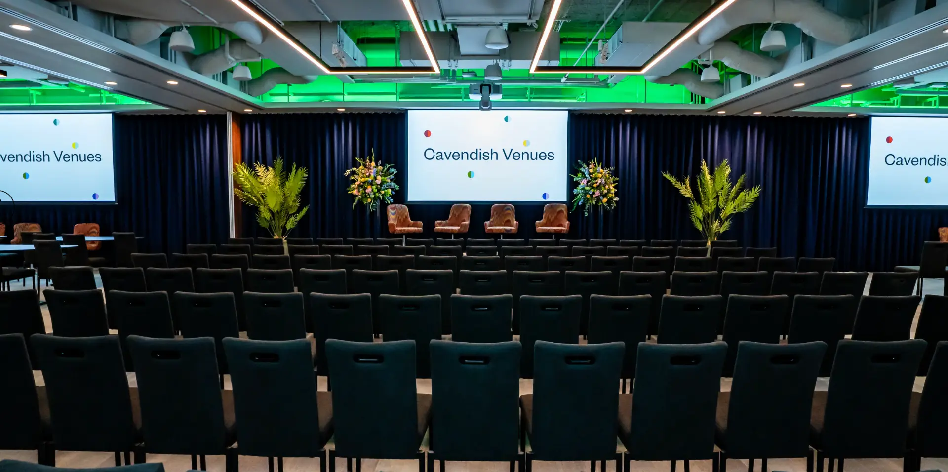Cavendish Venues auditorium set up with tiered seating and stage